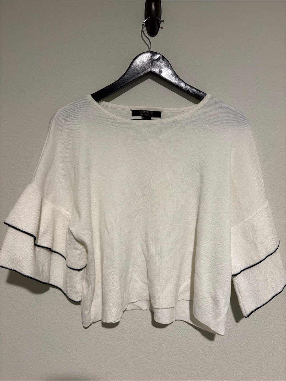 White Ruffle-Sleeve Knit Top with Black Trim